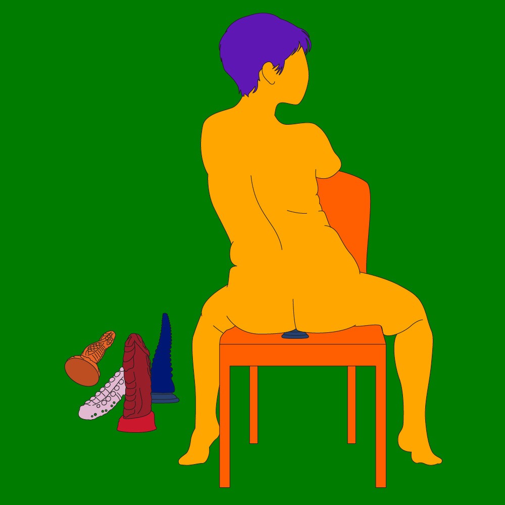 A naked illustrated woman sat on a chair and and facing it. She's also sat on a suction-cup dildo with a collection of dildos beside the chair.